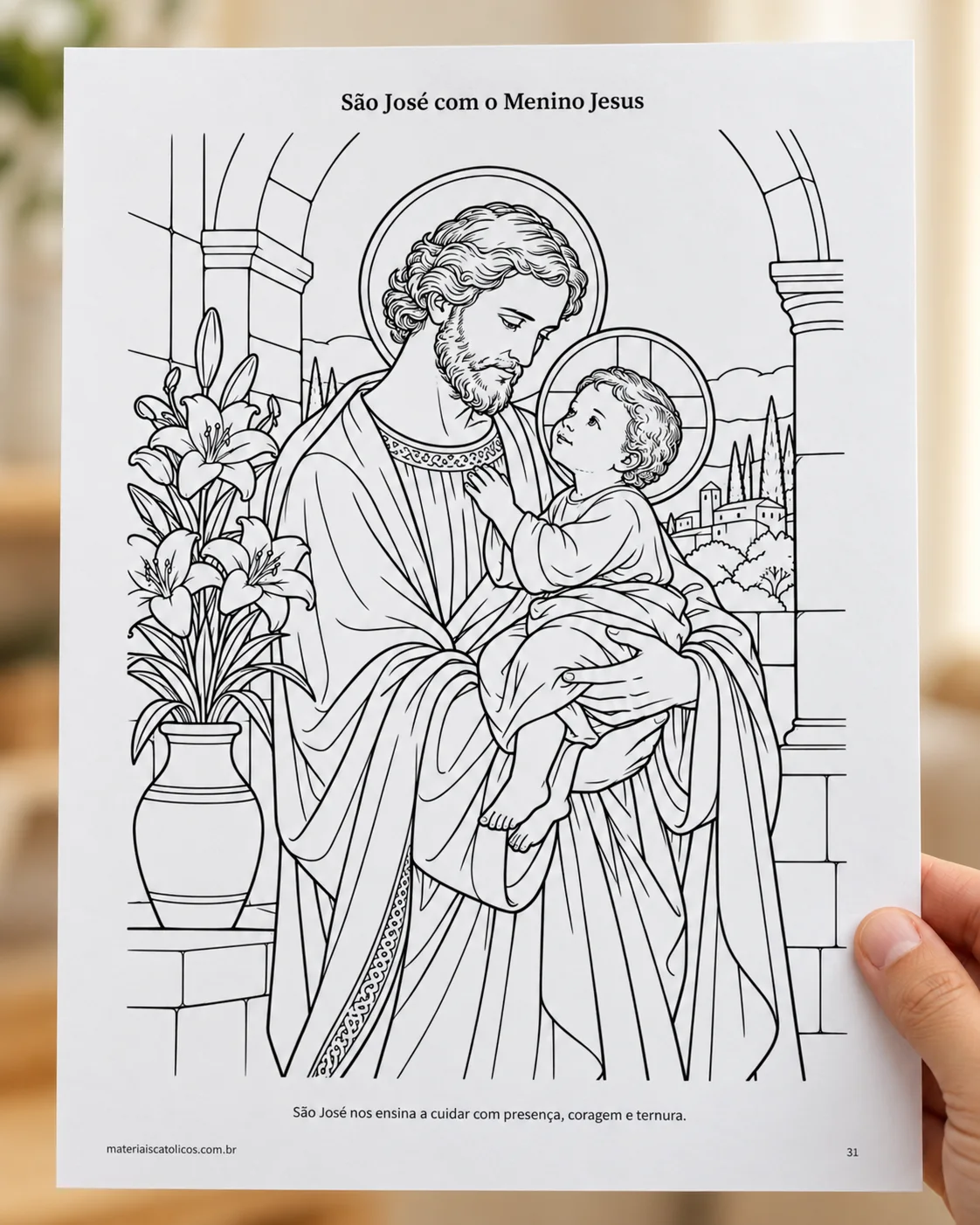 Ilustração de São José com o Menino Jesus em uma página apresentada por uma mão adulta.